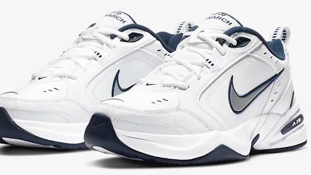 View of white and navy Nike shoes.