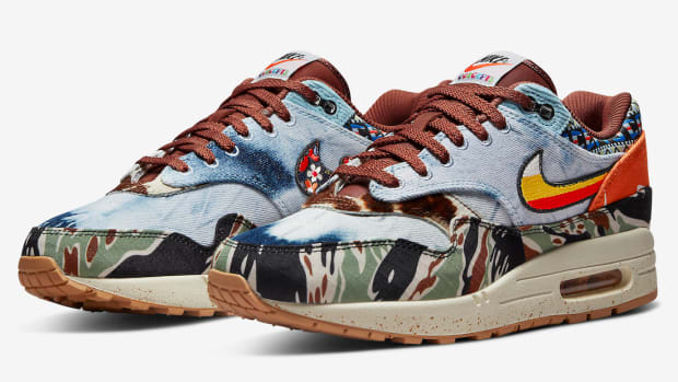 View of multi-color Nike Air Max 1 shoes.