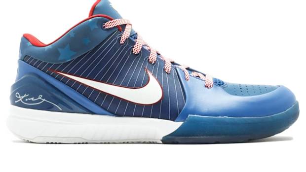 Side view of blue, white, and red Nike Kobe shoe.
