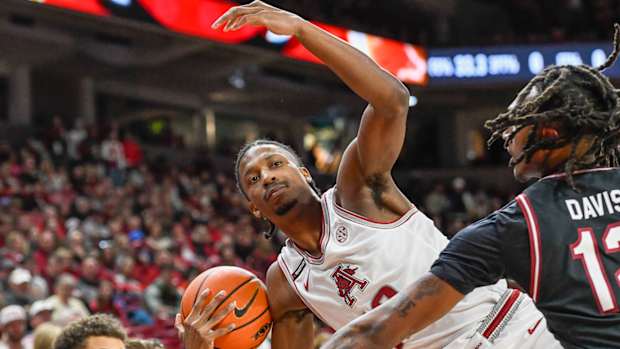 Razorbacks' Tramon Mark gets shove out of bounds against South Carolina
