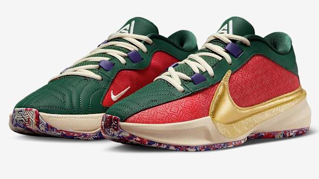 Side view of Giannis Antetokounmpo's green, red, and gold Nike shoes.