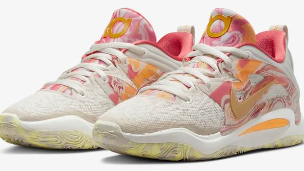 View of pink and orange Nike KD shoes.