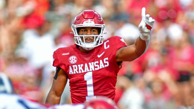 Razorbacks safety Jalen Catalon directs the secondary during a win over Georgia Southern last season at Razorback Stadium.