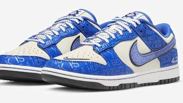 Side view of blue and white Nike Dunk sneakers.