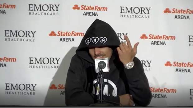 Trae Young wears Mamba & Mambacita Sports Foundation hoodie designed by Vanessa Bryant.
