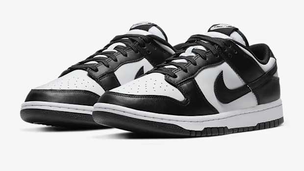 View of white and black Nike Dunk shoes.