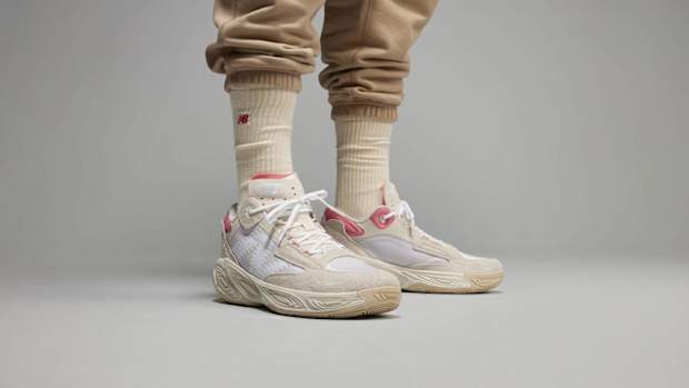 Zach LaVine wears tan and pink New Balance basketball shoes.