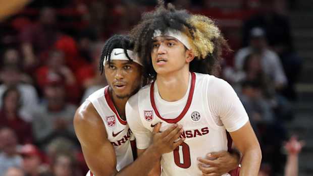Arkansas guards Ricky Council and Trevon Brazile talk strategy against Troy.
