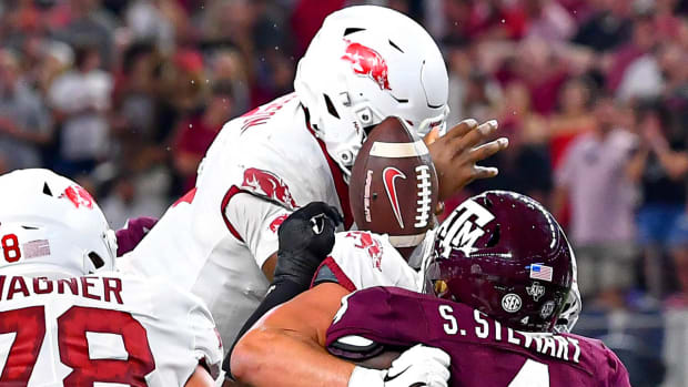 Arkansas quarterback KJ Jefferson fumbles the ball trying to jump over the goal line against Texas A&M in Arlington.