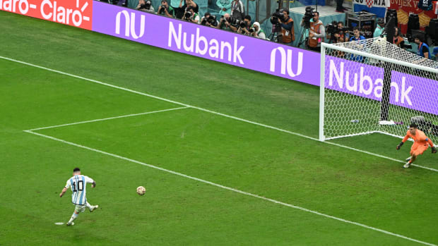 Argentina captain Lionel Messi pictured dispatching a penalty kick past Croatia keeper Dominik Livakovic in the semi-finals of the 2022 World Cup