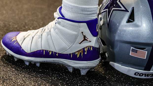 View of Dak Prescott's white and blue Air Jordan cleats.