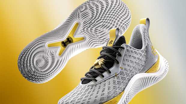 Detailed look at Stephen Curry's grey and gold shoes.