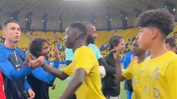 Cristiano Ronaldo (left) pictured shouting at son Cristiano Jr (right) at Al Nassr's Al-Awwal Park stadium in February 2024