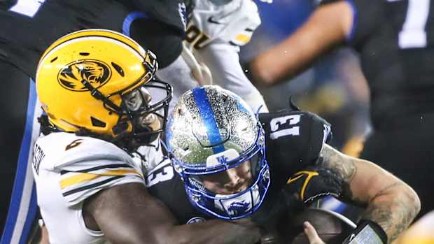 Missouri Tigers defensive lineman Darius Robinson (6) sacks Kentucky Wildcats quarterback Devin Leary (13) as Mizzou manhandled UK 38-21.