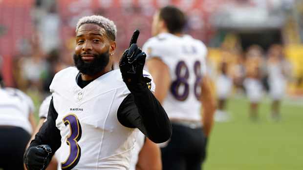 Baltimore Ravens wide receiver Odell Beckham Jr. waves to fans during warmups.