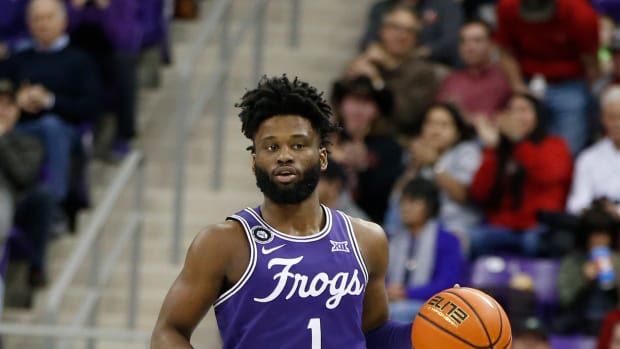 Feb 26, 2022; Fort Worth, Texas, USA; TCU Horned Frogs guard Mike Miles (1) dribbles up court in the first half against the Texas Tech Red Raiders at Ed and Rae Schollmaier Arena. Mandatory Credit: Tim Heitman-USA TODAY Sports