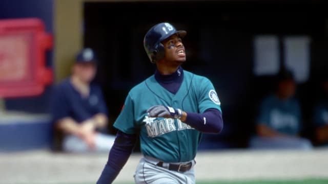 Seattle Mariners outfielder Ken Griffey Jr. hits a home run.