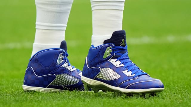 Dallas Cowboys quarterback Dak Prescott's blue and white Air Jordan cleats.