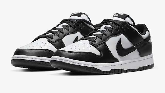 View of white and black Nike Dunk shoes.