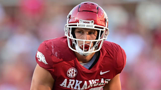 Arkansas linebacker Drew Sanders take a peek into the Missouri State backfield.