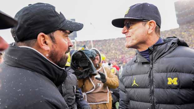 Ohio State coach Ryan Day and Michigan coach Jim Harbaugh