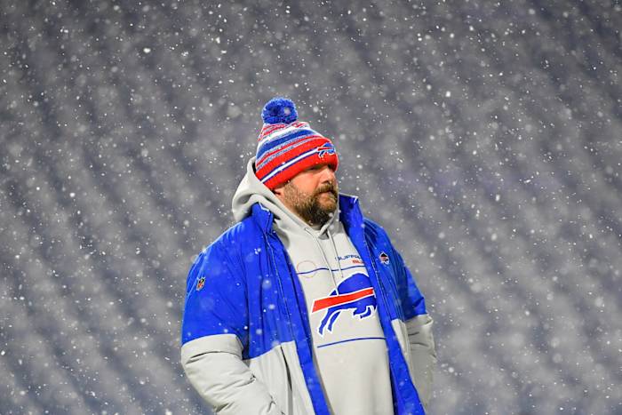 Dec 6, 2021; Orchard Park, New York, USA; Buffalo Bills offensive coordinator Brian Daboll looks on during a snow storm prior to the game against the New England Patriots at Highmark Stadium.