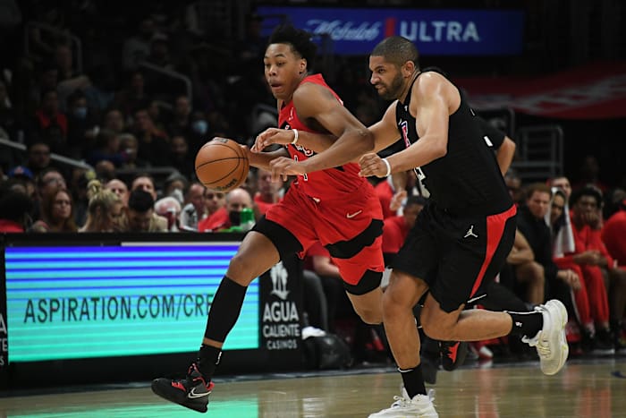 Toronto Raptors forward Scottie Barnes (4) moves the ball against Los Angeles Clippers forward Nicolas Batum (33) during the second half at Crypto.com Arena