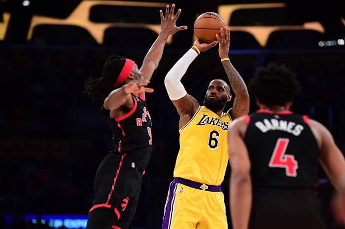 Los Angeles Lakers forward LeBron James (6) shoots against Toronto Raptors forward Precious Achiuwa (5) during the second half at Crypto.com Arena