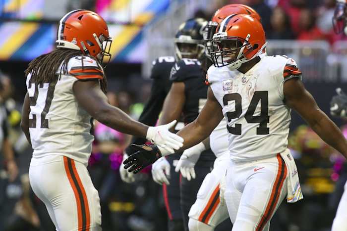 Oct 2, 2022; Atlanta, Georgia, USA; Cleveland Browns running back Nick Chubb (24) celebrates after a touchdown with running back Kareem Hunt (27) against the Atlanta Falcons in the second half at Mercedes-Benz Stadium. Mandatory Credit: Brett Davis-USA TODAY Sports