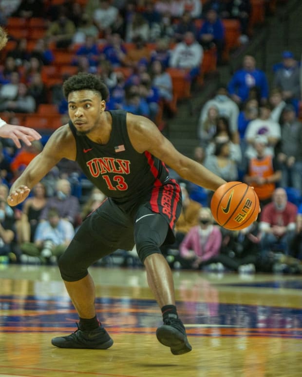 Feb 11, 2022; Boise, Idaho, USA; UNLV Rebels guard Bryce Hamilton (13) dribbles the ball during the first half against the Boise State Broncos at ExtraMile Arena. Mandatory Credit: Brian Losness-USA TODAY Sports
