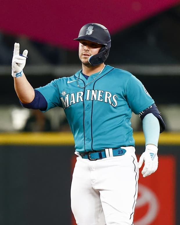 Sep 30, 2022; Seattle, Washington, USA; Seattle Mariners first baseman Ty France (23) reacts after hitting an RBI-double against the Oakland Athletics during the first inning at T-Mobile Park. Mandatory Credit: Joe Nicholson-USA TODAY Sports