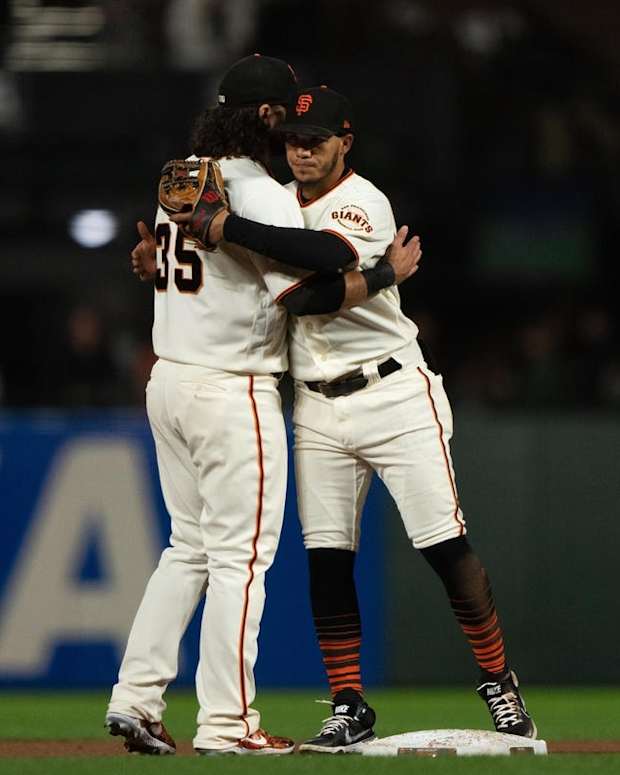 Sep 29, 2022; San Francisco, California, USA; San Francisco Giants shortstop Brandon Crawford (35) celebrates with second baseman Thairo Estrada (39) after defeating the Colorado Rockies at Oracle Park. Mandatory Credit: Stan Szeto-USA TODAY Sports