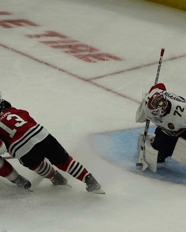 Oct 25, 2022; Chicago, Illinois, USA; Florida Panthers goaltender Sergei Bobrovsky (72) makes a save on Chicago Blackhawks center Max Domi (13) during the second period at United Center. Mandatory Credit: David Banks-USA TODAY Sports