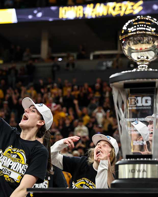 Iowa guard Caitlin Clark (22) celebrates the win after the game against Nebraska at Target Center in Minneapolis on March 10, 2024.