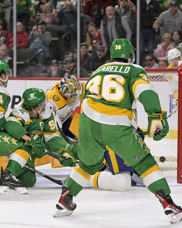 Mar 10, 2024; Saint Paul, Minnesota, USA; Minnesota Wild forward Kirill Kaprizov (97) scores a power play goal against the Nashville Predators during the second period at Xcel Energy Center.