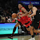 Toronto Raptors forward Scottie Barnes (4) moves the ball against Los Angeles Clippers forward Nicolas Batum (33) during the second half at Crypto.com Arena