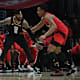 Los Angeles Clippers forward Marcus Morris Sr. (8) controls the ball against Toronto Raptors forward Scottie Barnes (4) during the second half at Crypto.com Arena
