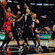 Toronto Raptors forward Scottie Barnes (4) controls the ball against Los Angeles Clippers guard Amir Coffey (7) during the second half at Crypto.com Arena