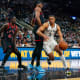 San Antonio Spurs forward Keldon Johnson (3) drives against Toronto Raptors forward Precious Achiuwa (5) in the first half at the AT&T Center