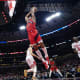 Toronto Raptors forward Scottie Barnes (4) goes up for a dunk against the Chicago Bulls during the first quarter at United Center
