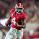 Alabama Crimson Tide quarterback Jalen Milroe (4) carries the ball against the Vanderbilt Commodores during the second half at Bryant-Denny Stadium.