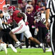 Alabama Crimson Tide running back Jahmyr Gibbs (1) runs for a touchdown against the Mississippi State Bulldogs during the first half at Bryant-Denny Stadium.