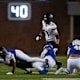 UAlbany wide receiver gets tackled by SDSU player on Friday, Dec. 15, 2023 at Dana J. Dykhouse in Brookings.