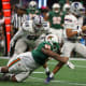 Dec 16, 2023; Atlanta, GA, USA; Florida A&M Rattlers defensive lineman Makody Robertson (96) pressures Howard Bison quarterback Quinton Williams (1) in the first half at Mercedes-Benz Stadium.