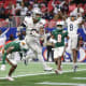 Dec 16, 2023; Atlanta, GA, USA; Howard Bison running back Jarett Hunter (2) scores a touchdown against the Florida A&M Rattlers in the first half at Mercedes-Benz Stadium.