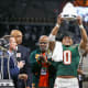 Dec 16, 2023; Atlanta, GA, USA; Florida A&M Rattlers linebacker Isaiah Major (0) holds up the defensive MVP trophy after a victory against the Howard Bison in the Celebration Bowl at Mercedes-Benz Stadium.