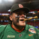 Dec 16, 2023; Atlanta, GA, USA; Florida A&M Rattlers offensive lineman Cesar Reyes (77) celebrates with a cigar after a victory against the Howard Bison in the Celebration Bowl at Mercedes-Benz Stadium.