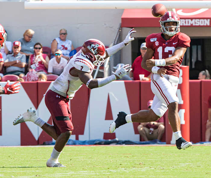 Tua Tagovailoa makes a throw against New Mexico State