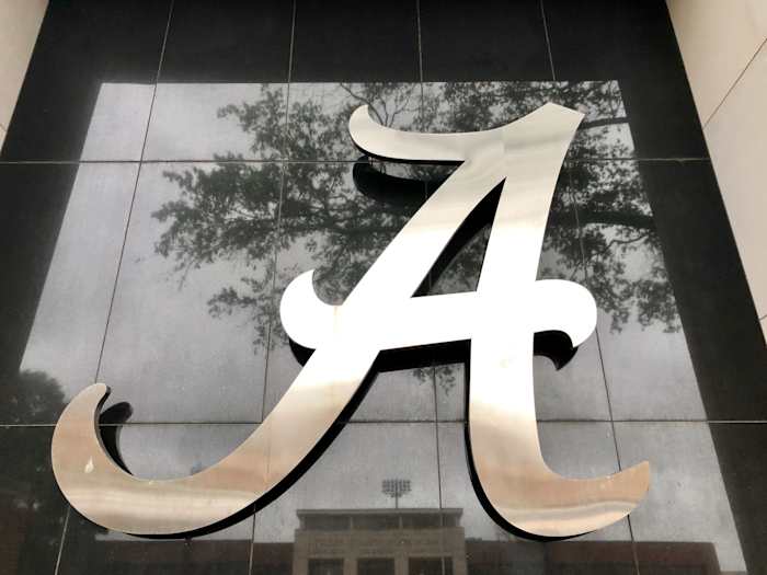 Alabama logo, black, football building reflected