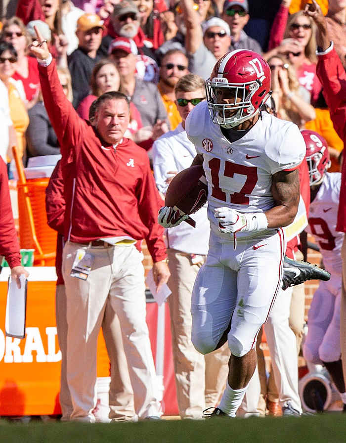 Jaylen Waddle with Butch Jones in the background vs. Tennessee in 2018